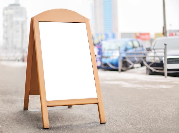 Photo advertising board on city street