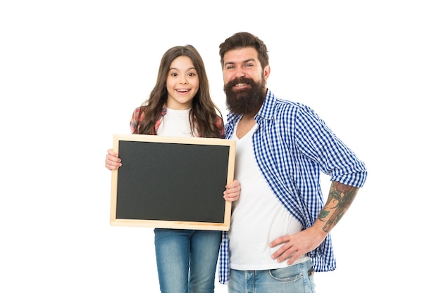 Advertising or promotion Father and daughter hold chalkboard copy space Girl with dad on white background International childrens day Happy childhood Family news Sale and discount We love it