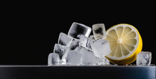 advertising stilllife with sliced lemon in ice cubes over night club background Bar counter