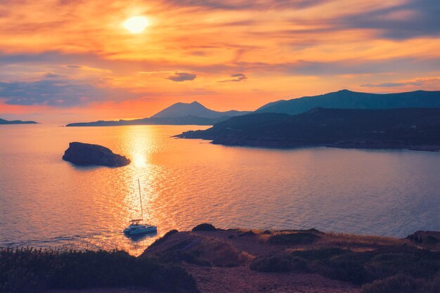 Aegean sea with islands view on sunset