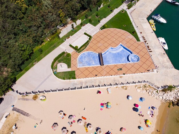 Aerail view of sand beach near sea and non working pool during lockdown quarantine near Varna and Golden Beach, Bulgaria