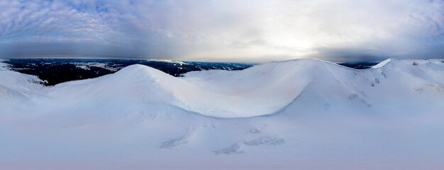 Aerial 360 view of the evening winter panorama