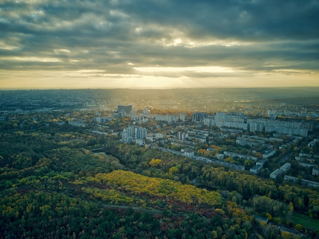 Aerial over the city in autumn at sunset. Kihinev city, Moldova republic of.