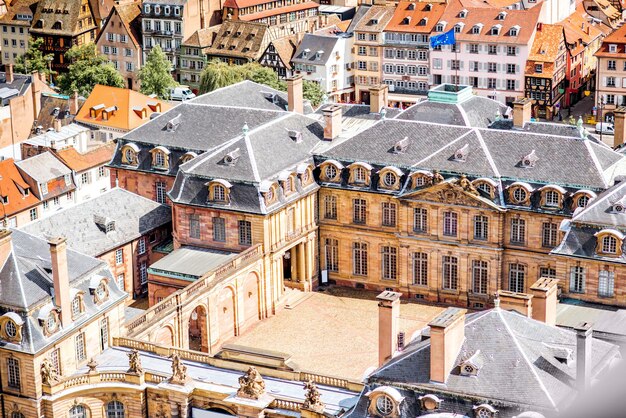 Aerial cityscape view on the old town with courtyard of Rohan palace in Strasbourg city in France