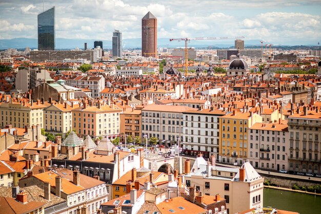 Aerial cityscape view with beautiful old buildings and skyscrapers in Lyon city