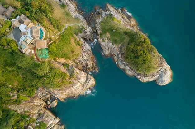 Aerial drone bird's eye view photo of Modern villa on mountain Seaside Resort