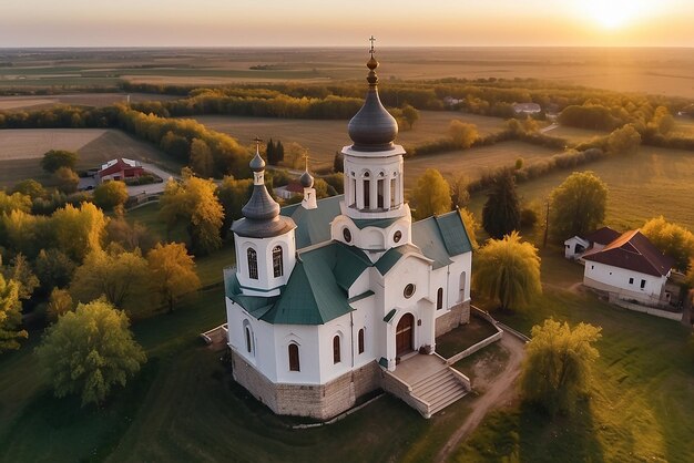 Aerial drone panorama view of a church at sunset village