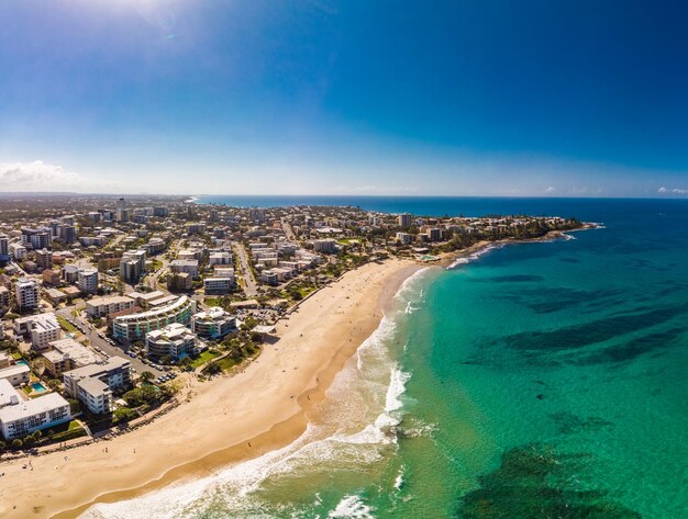 Aerial drone panoramic image of ocean waves on a kings beach caloundra queensland australia