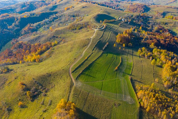 Aerial drone shot over autumn scenery in Transylvania Romania