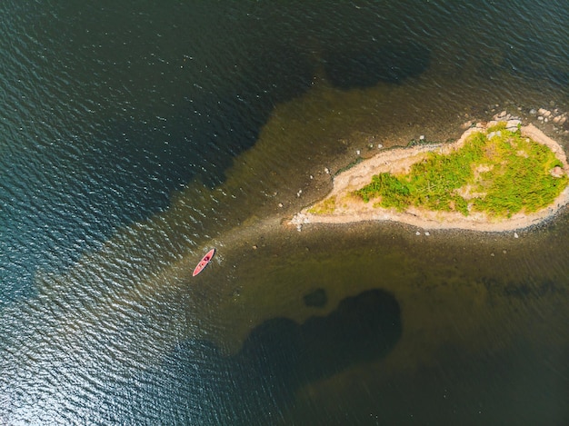 Aerial drone top view kayaking in the sea