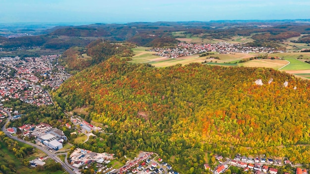 Aerial drone view of autumn landscape of valley between mountains autumn forest BadenWurttemberg Germany