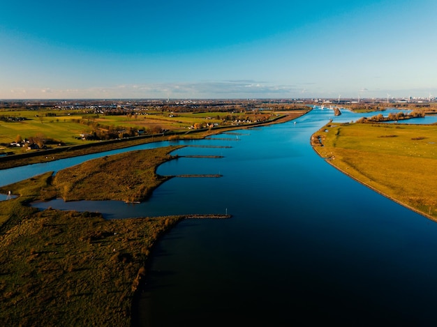 Aerial drone view of the beautiful river in the Netherlands, Europe.