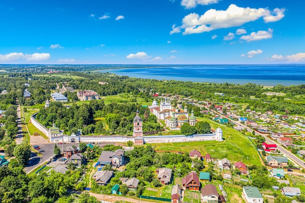 Aerial drone view of the Dormition Goritsky Monastery in Pereslavl Zalessky, Yaroslavl Region, Russia. Summer sunny day. Touristic Golden ring of Russia.