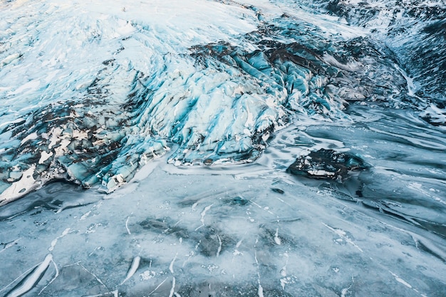 Photo aerial drone view glacier iceland slheimajkull melting ice climate change and global warming con