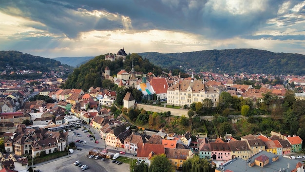 Aerial drone view of the Historic Centre of Sighisoara Romania Old buildings streets