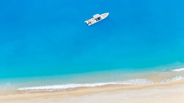 Aerial drone view of moored boat near the coast of Zakynthos, Greece