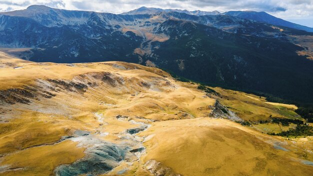 Aerial drone view of nature in Romania. Carpathian mountains, sparse vegetation