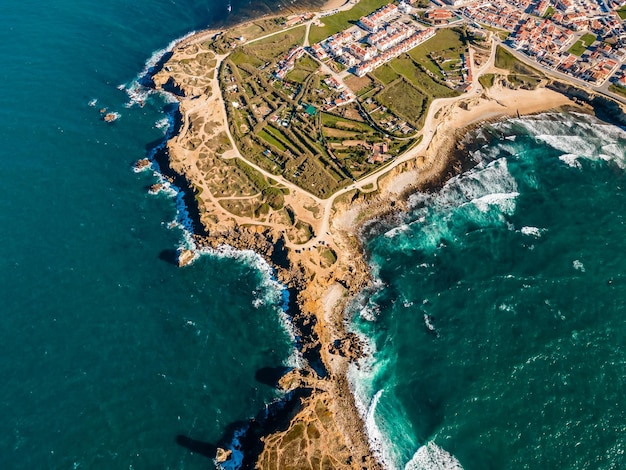 Aerial drone view of Peniche Portugal Surfers City at Atlantic ocean coast