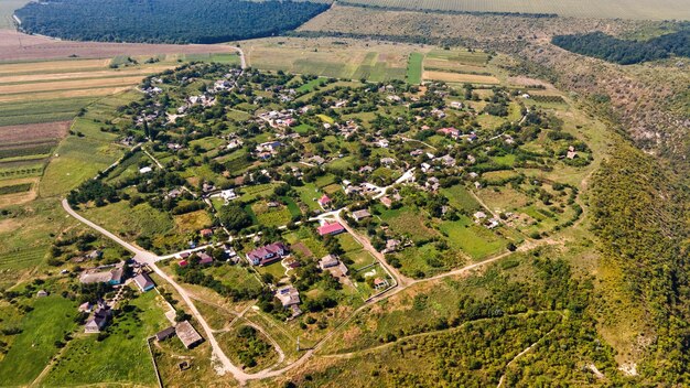 Aerial drone view of a village located on a valley's cliff in Moldova