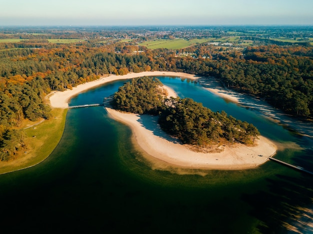 Aerial drone view of the white sandy lake the Henschotermeer in the Netherlands, Europe.