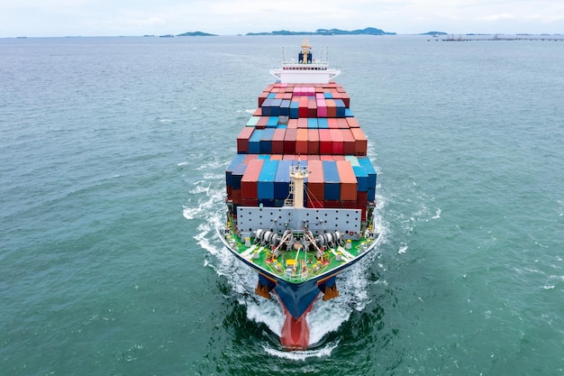 Aerial front view container ship carrying cargo container import export internatioonal