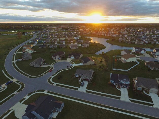 Aerial Golden Hour Suburban Bliss Serene Lakeside Community