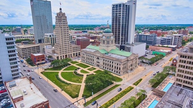 Aerial of Indiana Allen County Fort Wayne courthouse downtown with city