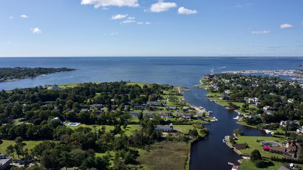 Aerial landscape shot over Bay Shore, Long Island, New York, the US on a sunny day