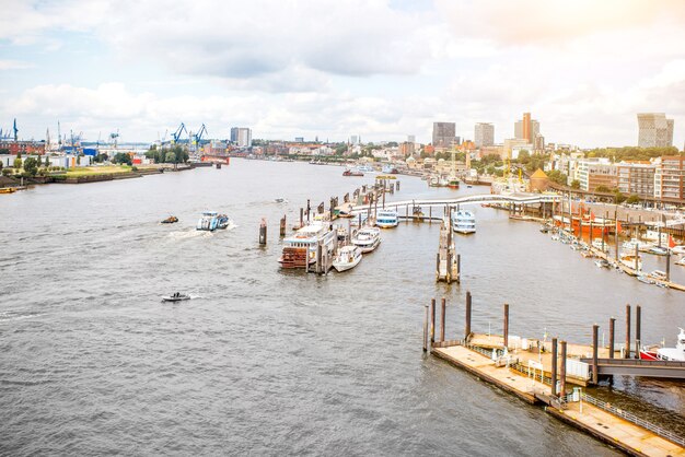 Aerial landscape view on the Elbe river and port in Hamburg city, Germany