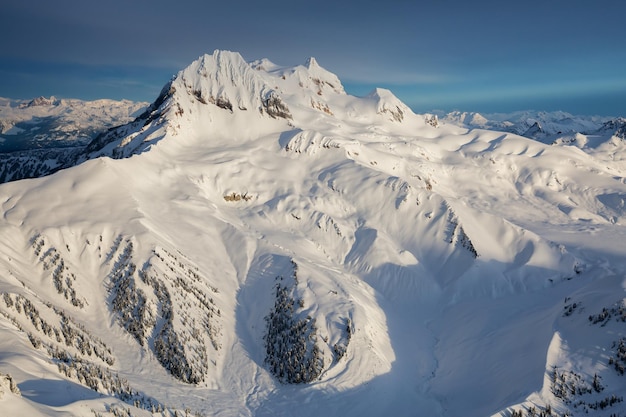 Aerial Landscape view of Garibaldi Mountain during a winter sunrise