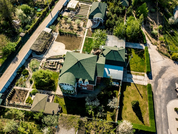 Aerial luxury cottage settlement on a sunny day 