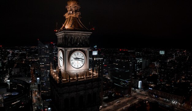 Photo aerial night view of the palace of culture and science