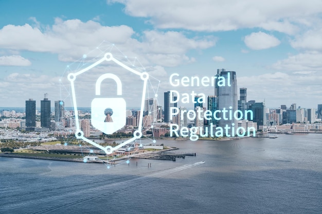 Aerial panoramic helicopter city view of new jersey city\
financial downtown skyscrapers gdpr hologram concept of data\
protection regulation and privacy for all individuals