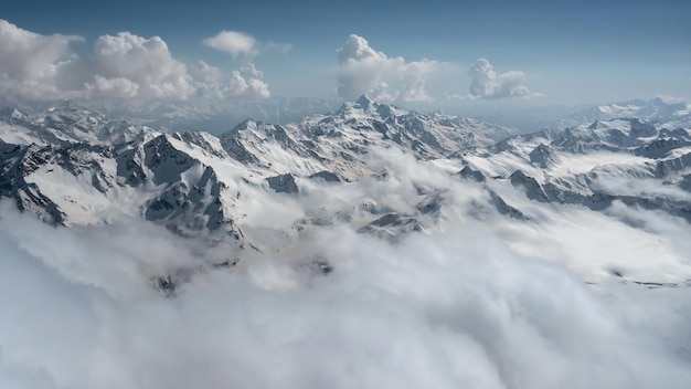 Aerial panoramic landscape with mountains partially hidden behind low clouds Caucasus Russia