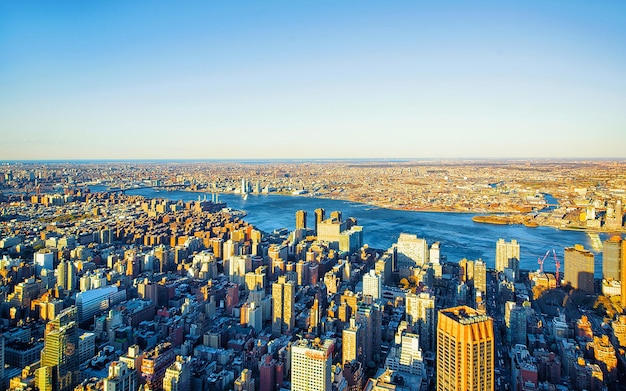 Aerial panoramic view on East Village in Downtown, New York city, NYC, USA, Williamsburg Bridge, Brooklyn. East River. Manhattan skyline. American architecture building. Panorama of Metropolis