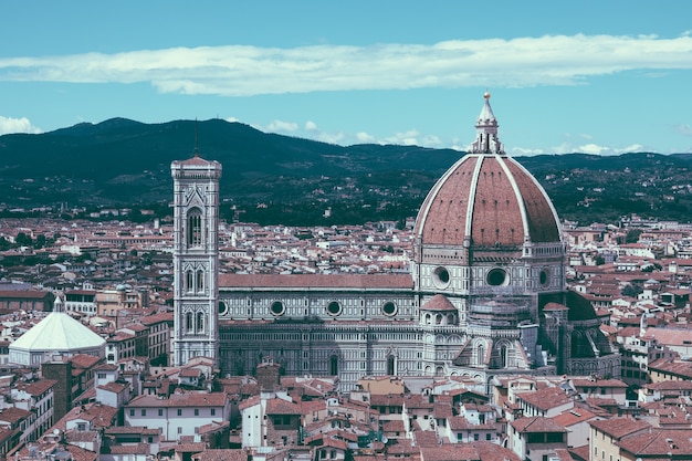 Aerial panoramic view of old city of Florence and Cattedrale di Santa Maria del Fiore (Cathedral of Saint Mary of the Flower) from Palazzo Vecchio