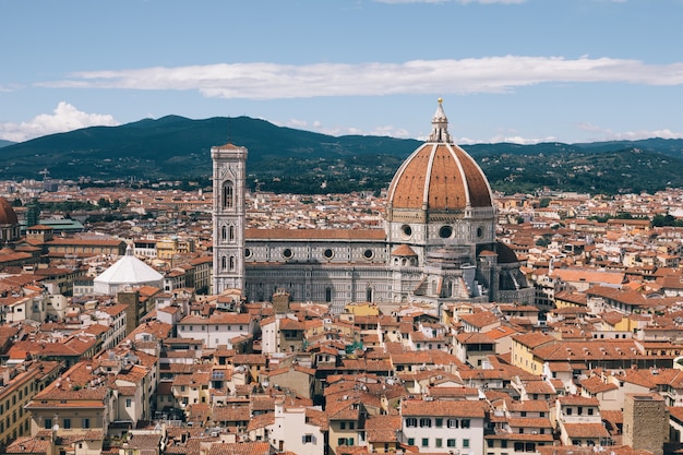 Aerial panoramic view of old city of Florence and Cattedrale di Santa Maria del Fiore (Cathedral of Saint Mary of the Flower) from Palazzo Vecchio