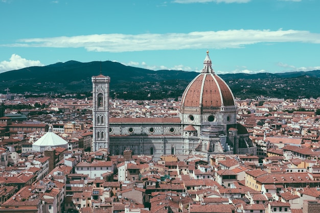 Aerial panoramic view of old city of Florence and Cattedrale di Santa Maria del Fiore (Cathedral of Saint Mary of the Flower) from Palazzo Vecchio