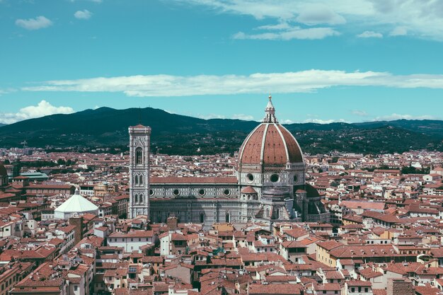 Aerial panoramic view of old city of Florence and Cattedrale di Santa Maria del Fiore (Cathedral of Saint Mary of the Flower) from Palazzo Vecchio