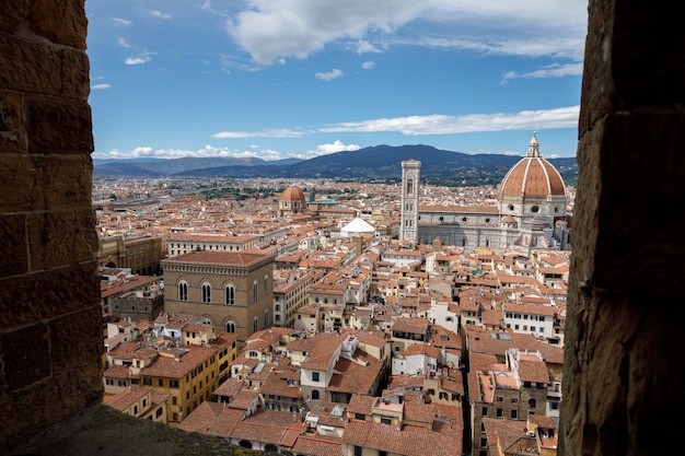 Aerial panoramic view of old city of Florence and Cattedrale di Santa Maria del Fiore (Cathedral of Saint Mary of the Flower) from Palazzo Vecchio