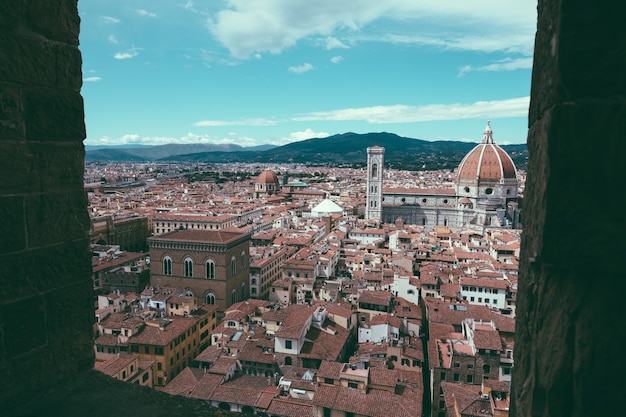 Aerial panoramic view of old city of Florence and Cattedrale di Santa Maria del Fiore (Cathedral of Saint Mary of the Flower) from Palazzo Vecchio