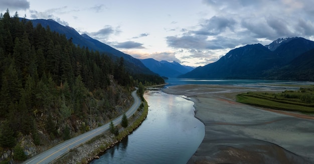 Aerial panoramic view of the river in the valley in the Canadian Mountain Landscape