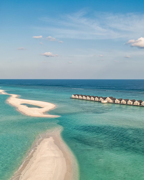 Aerial photo of beautiful Maldives paradise tropical beach Amazing view blue turquoise lagoon water