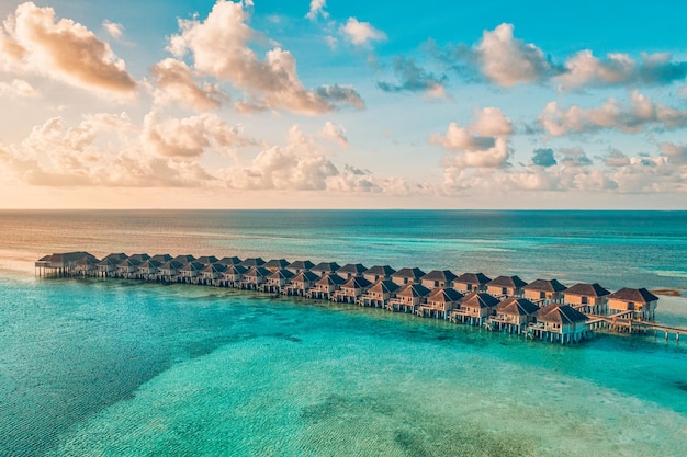 Aerial photo of beautiful Maldives paradise tropical beach Amazing view blue turquoise lagoon water