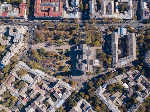 Aerial photography from a drone on the street, the Spaso-Preobrazhensky Cathedral, the roofs of houses and roads with cars on a sunny day. Ukraine, Odessa