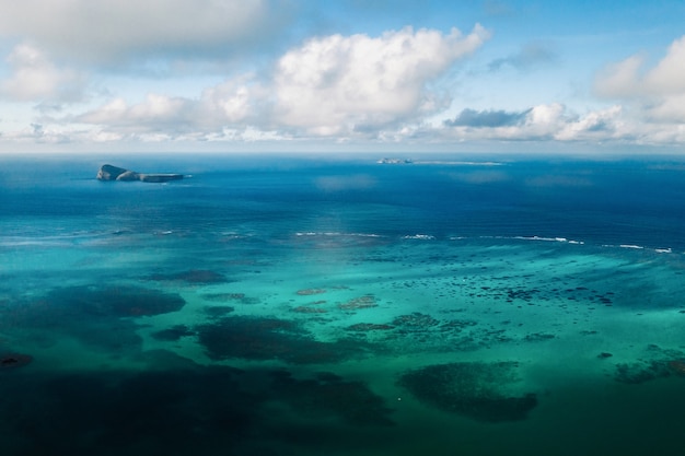 Aerial picture of the north, north east coast of Mauritius Island. Beautiful lagoon of Mauritius Island shot from above.