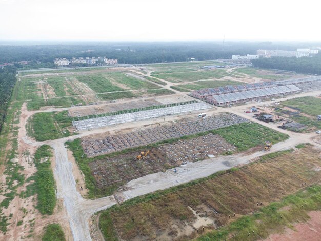 aerial scene of the wooden village at the forest mangrove landscape