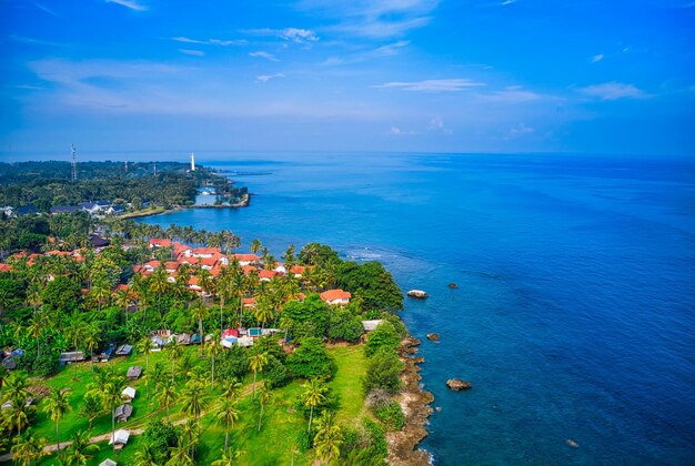 Aerial shot of houses near body of water photo