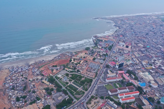 Aerial shot of a seaport in Ghana under the cloudy skies