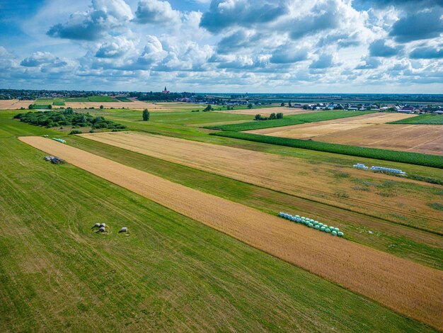 Aerial shot of strips of farmland and meadows in Upper Silesia, Poland